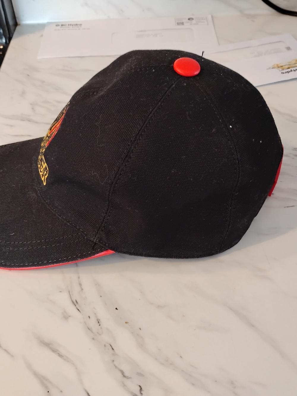 Moncler Black Cap with Red & Yellow Embroidered Logo - Picture 2 of 3